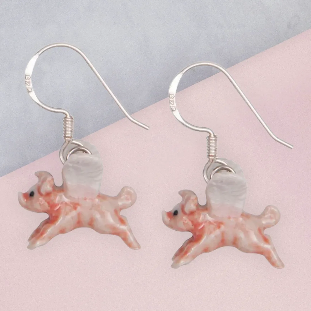 Flying pig earrings by And Mary